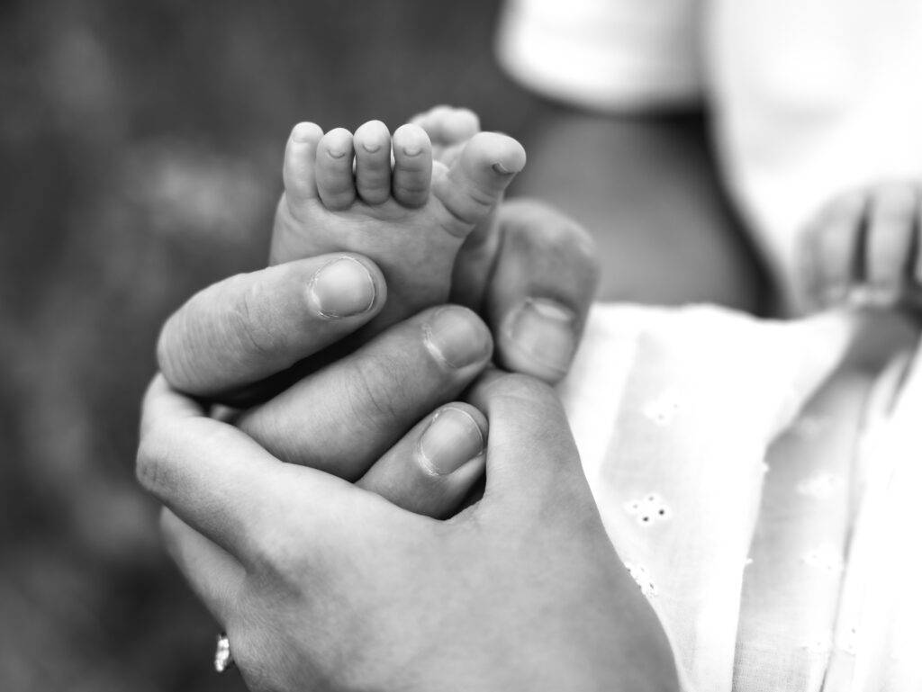 A relaxed late summer engagement session in East Spokane featuring golden fields, natural light, and an outdoors-loving couple.