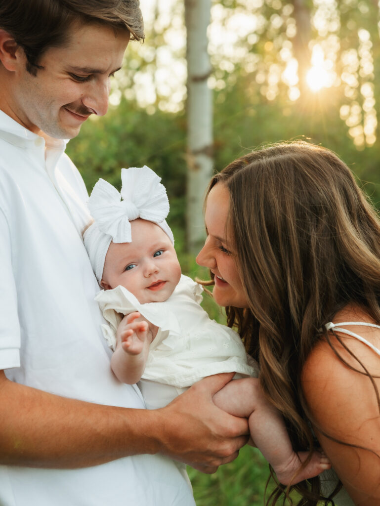A relaxed late summer engagement session in East Spokane featuring golden fields, natural light, and an outdoors-loving couple.
