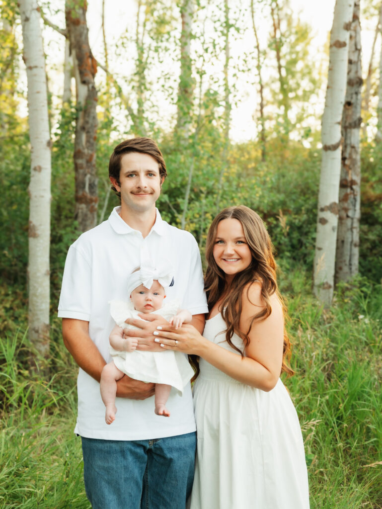 A relaxed late summer engagement session in East Spokane featuring golden fields, natural light, and an outdoors-loving couple.