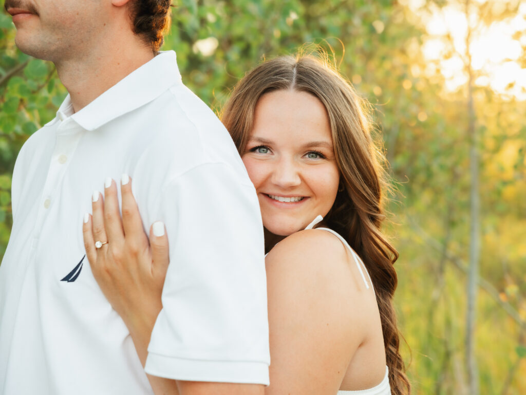 A relaxed late summer engagement session in East Spokane featuring golden fields, natural light, and an outdoors-loving couple.