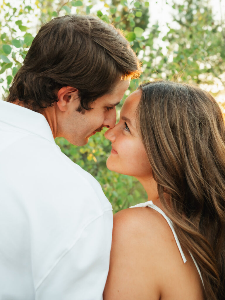 A relaxed late summer engagement session in East Spokane featuring golden fields, natural light, and an outdoors-loving couple.