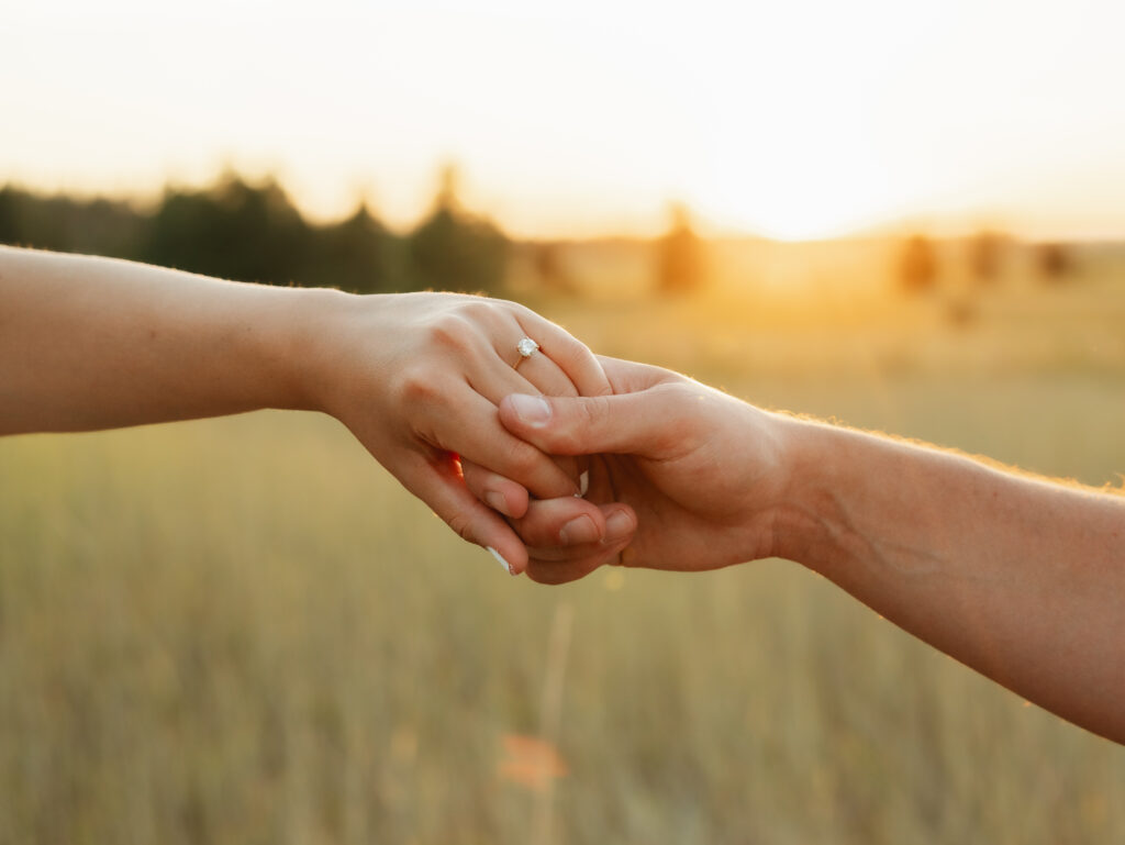 A relaxed late summer engagement session in East Spokane featuring golden fields, natural light, and an outdoors-loving couple.