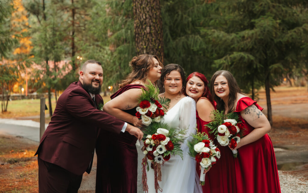 A cozy November wedding at Sleeping Lady Mountain Resort in Leavenworth, WA featuring DIY florals, a bridal cape, and mountain views.