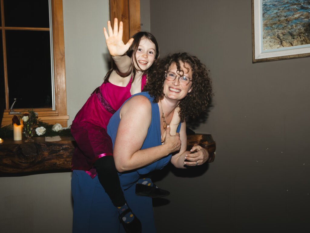 A cozy November wedding at Sleeping Lady Mountain Resort in Leavenworth, WA featuring DIY florals, a bridal cape, and mountain views.