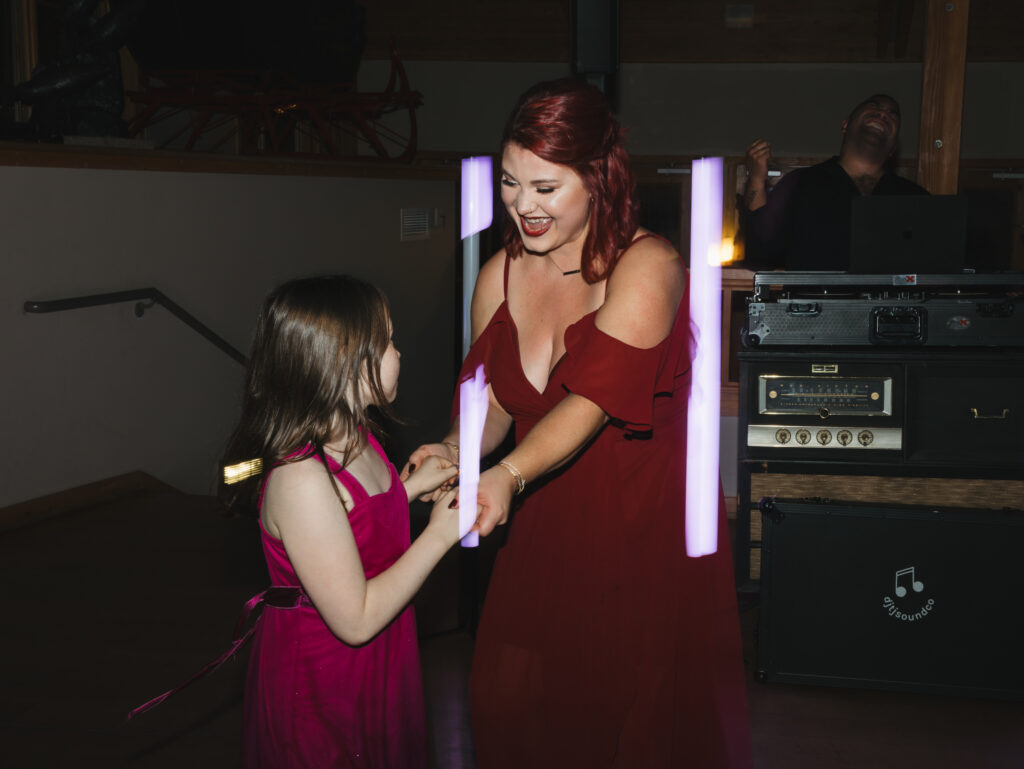 A cozy November wedding at Sleeping Lady Mountain Resort in Leavenworth, WA featuring DIY florals, a bridal cape, and mountain views.