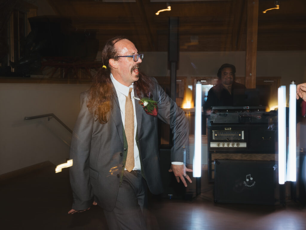 A cozy November wedding at Sleeping Lady Mountain Resort in Leavenworth, WA featuring DIY florals, a bridal cape, and mountain views.