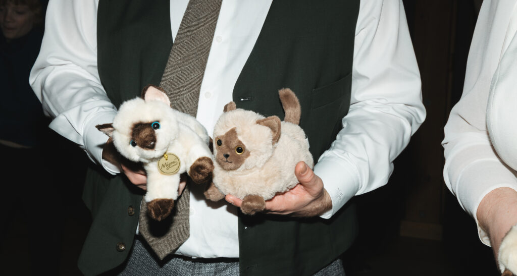 A cozy November wedding at Sleeping Lady Mountain Resort in Leavenworth, WA featuring DIY florals, a bridal cape, and mountain views.