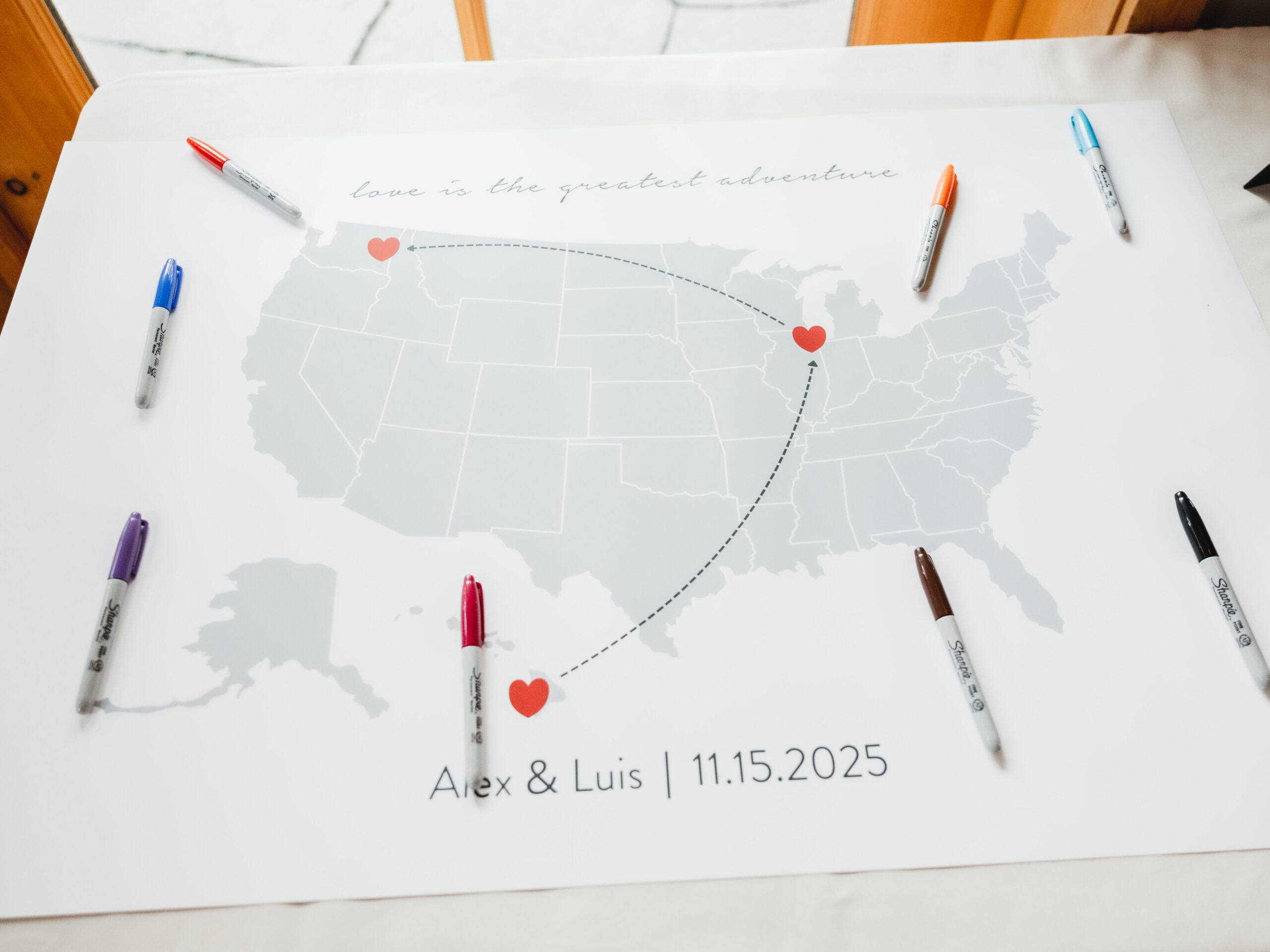 A cozy November wedding at Sleeping Lady Mountain Resort in Leavenworth, WA featuring DIY florals, a bridal cape, and mountain views. This travel welcome sign ties it all together. 