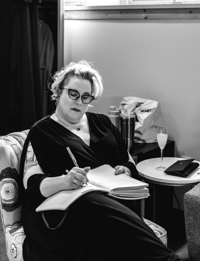 A cozy November wedding at Sleeping Lady Mountain Resort in Leavenworth, WA featuring DIY florals, a bridal cape, and mountain views.