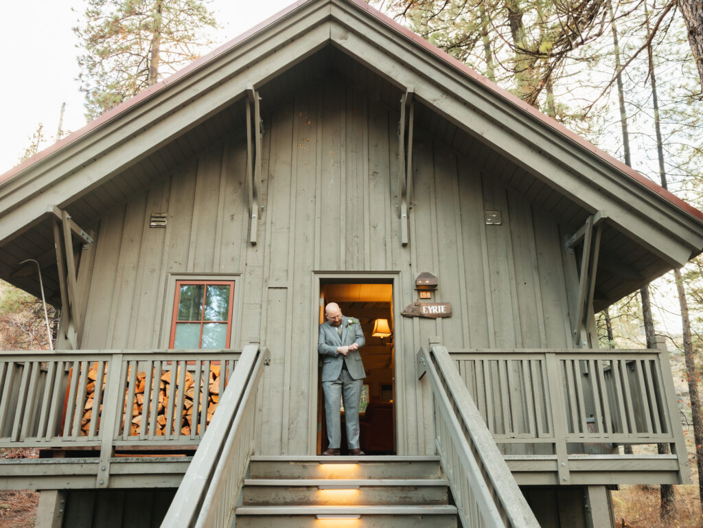 A cozy November wedding at Sleeping Lady Mountain Resort in Leavenworth, WA featuring DIY florals, a bridal cape, and mountain views.