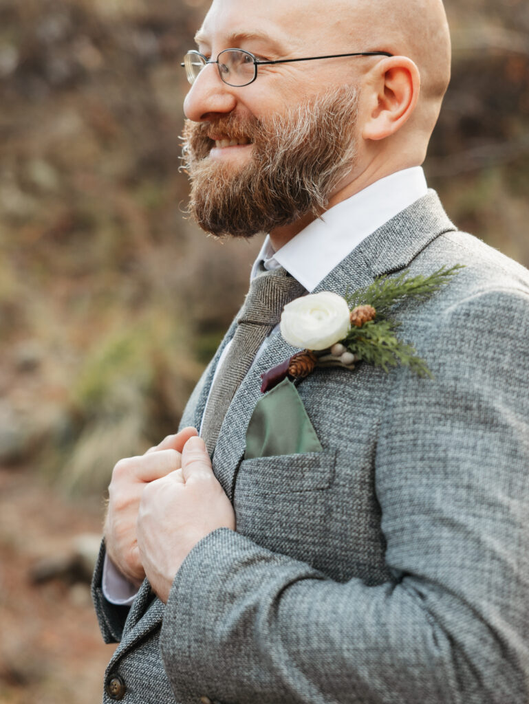 A cozy November wedding at Sleeping Lady Mountain Resort in Leavenworth, WA featuring DIY florals, a bridal cape, and mountain views.