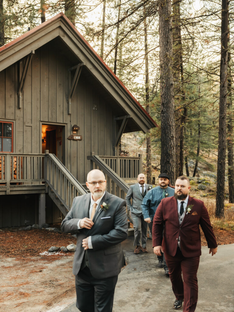 A cozy November wedding at Sleeping Lady Mountain Resort in Leavenworth, WA featuring DIY florals, a bridal cape, and mountain views.