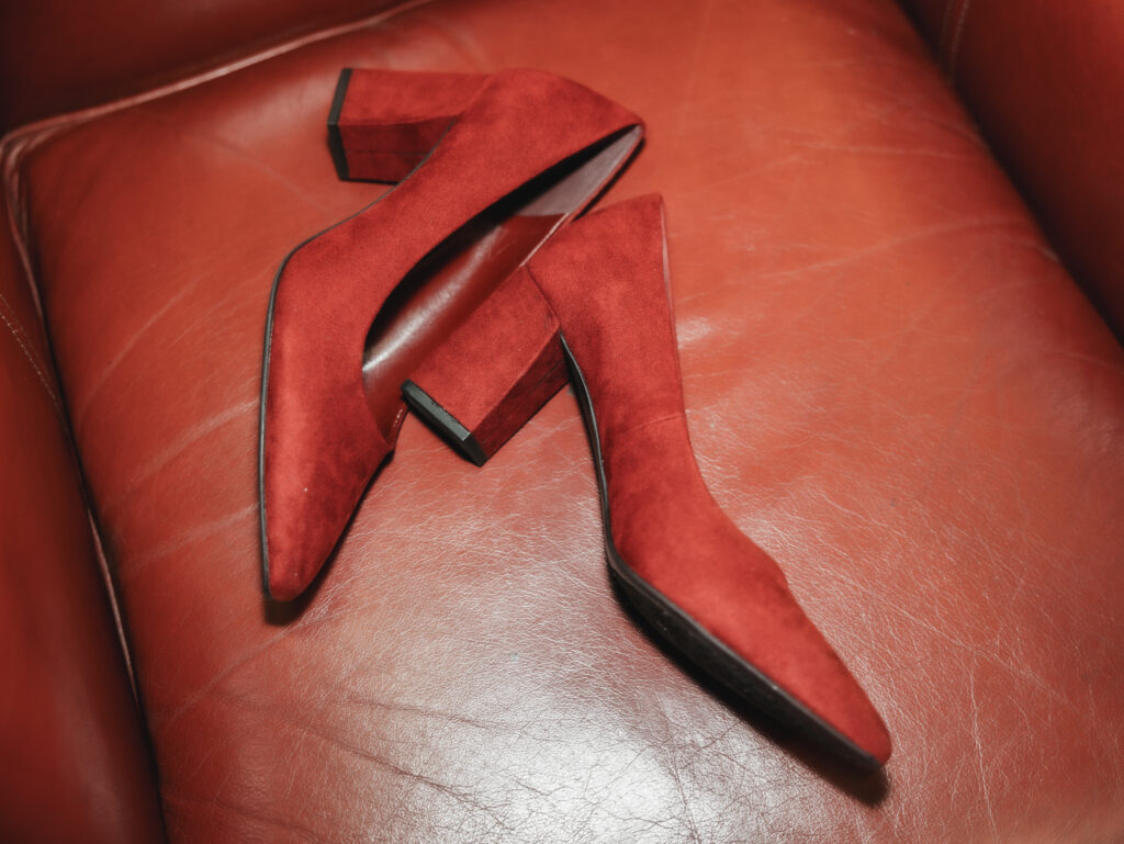 A cozy November wedding at Sleeping Lady Mountain Resort in Leavenworth, WA featuring DIY florals, a bridal cape, and mountain views.